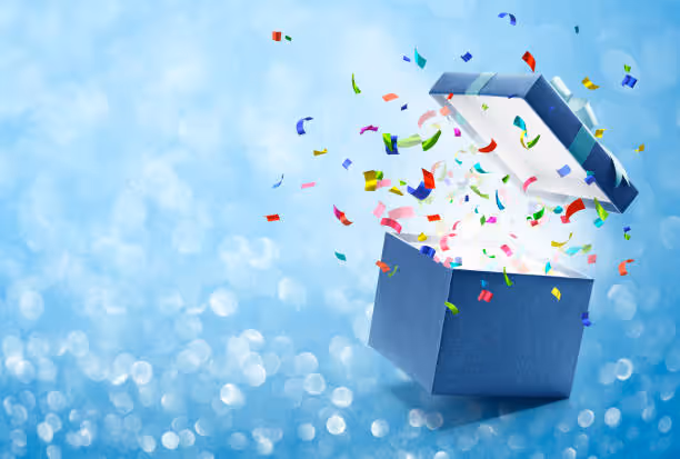 Confetti meletus dari sebuah kotak hadiah